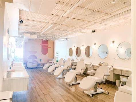 The Mia June facial bar — a bright room lined with treatment chairs